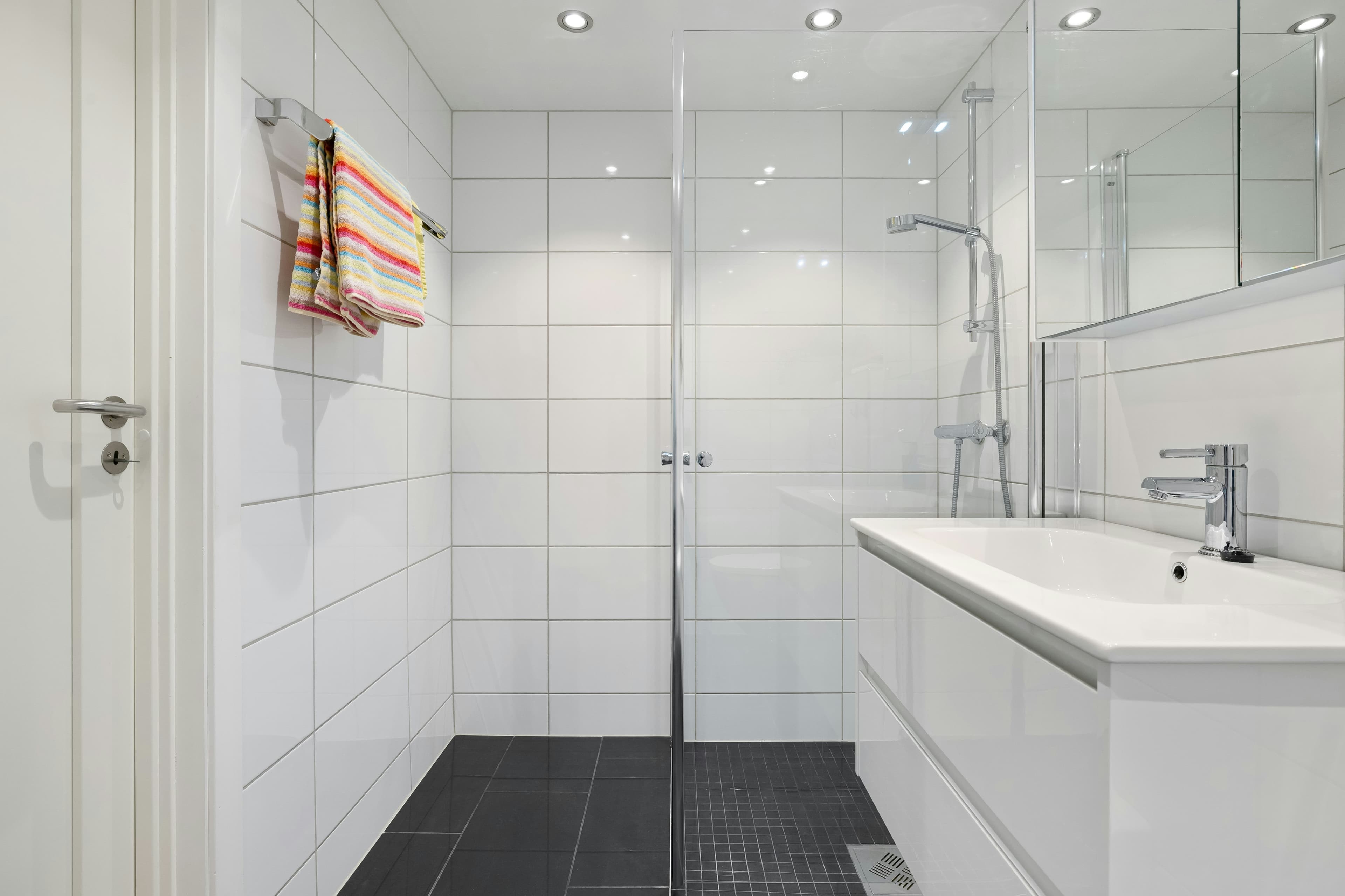 Modern bathroom shower with subway tile